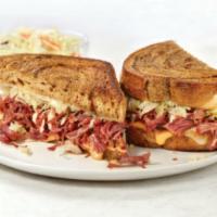 Marbled Rye Reuben · Hand-shredded corned beef, sauerkraut, Swiss cheese, and Thousand Island dressing on grilled...
