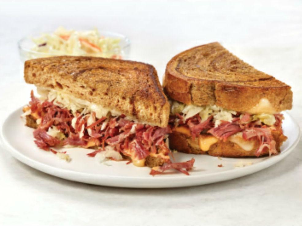 Marbled Rye Reuben · Hand-shredded corned beef, sauerkraut, Swiss cheese, and Thousand Island dressing on grilled rye bread.