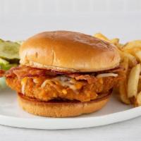 Chicken Ranch · Chicken-fried chicken breast, cheddar and Monterey Jack cheeses, and two cherrywood-smoked b...