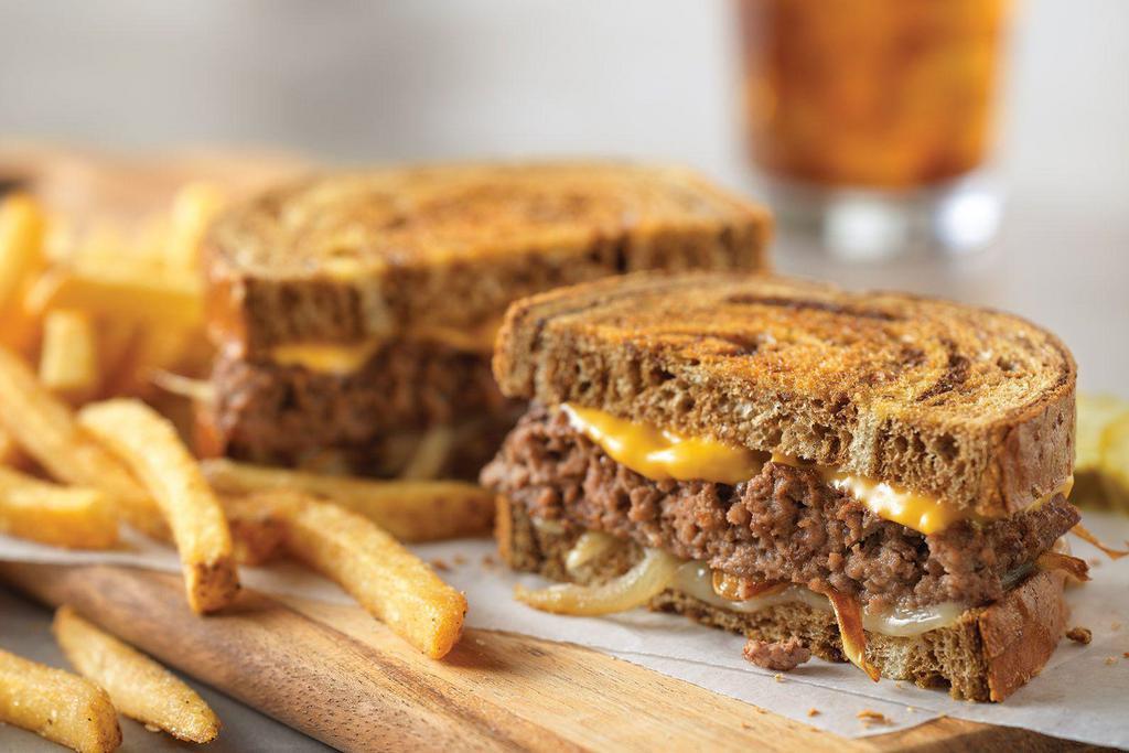 Patty Melt · Sauteed onions, American and Swiss cheeses on grilled marbled rye bread.