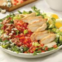Classy Cobb Salad · Grilled chicken breast, bacon, avocado, hard-boiled egg, tomato, crumbled bleu cheese on mix...