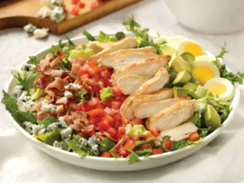 Classy Cobb Salad · Grilled chicken breast, bacon, avocado, hard-boiled egg, tomato, crumbled bleu cheese on mixed greens.