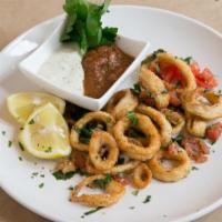 Calamari Dinner · Sauteed crispy calamari, olive oil, white wine and lemon.