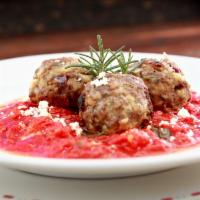 Keftedes Dinner · Comes with country-style Greek lamb meatballs and plum tomato sauce.