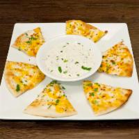 Ziziki Bread Dinner · Comes with pita broiled with cheese and herbs and Ziziki sauce.