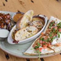Trio Appetizer · 3 bacon-wrapped Caribbean BBQ Shrimp, Hot Maryland Crab Dip and a 
Chicken Quesadilla, serve...