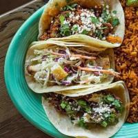 2 Taco Meal · 2 Street Tacos on soft corn tortillas, with beans and rice.