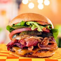 Bacon Chedda Burger · Beef Patty, Chedda Cheese, Bacon Caramelized Onions, Pickles, Tomatoes, Green Leaf Lettuce, ...