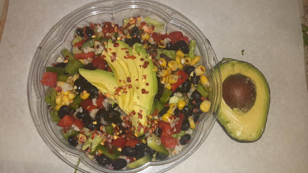 Viva Mexico Bowl · Brown rice or quinoa, romaine, black beans, tomato, cheddar, red and green peppers, sweet corn, olive oil, chili flakes, avocado, tortilla chips and sour cream.