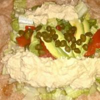 Sweet Hummus and Avocado Caper Wrap · Avocado, hummus, sweet red peppers and capers on whole-grain artisan wheat.