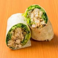 Grilled Chicken Caesar Wrap · Marinated grilled chicken, romaine, croutons, Asiago flakes, capers and Caesar dressing.