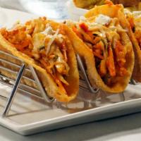Paneer Tacos (3 Pcs) · Spicy. Crumbled paneer, carrot, cabbage, Mexican and goat cheese, sriracha ranch. crispy she...
