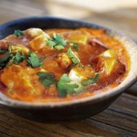 Paneer Butter Masala · Gluten free. Spicy. Cubed paneer, tomato, butter, cream, indian spices.