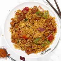Chicken 65 Fried Rice · Spicy chicken, curry leaves, Indian spice, dry red chili.