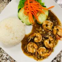 52. Com Tom Rim · Simmered shrimps with steam rice.