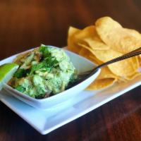 Guacamole · Hand crafted. Avocado, red onion, tomato, lime, jalapenos, and cilantro. Corn tortilla chips...