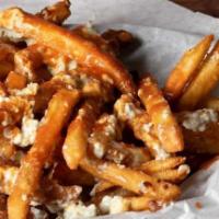 Turbo Fries · Tossed in our mild wing sauce and topped with crumbled bleu cheese served with a side of ble...