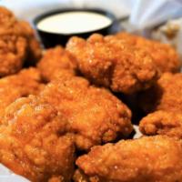 Boneless Wings · All white meat boneless wings tossed in your choice of sauce with ranch. Extra dressing for ...