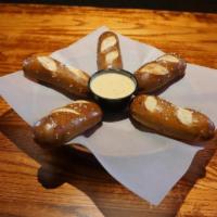 Pretzel Sticks · Warm, delicious pretzel sticks served with our tasty Jalapeno Cheese sauce.