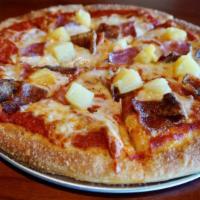 Hawaiian Pizza · Prepared with our homemade sauce, a sharp provolone cheese blend and topped with ham, pineap...