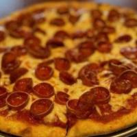Pepperoni Pizza · Piled high with tons of pepperoni and smothered with our homemade sauce and a sharp provolon...