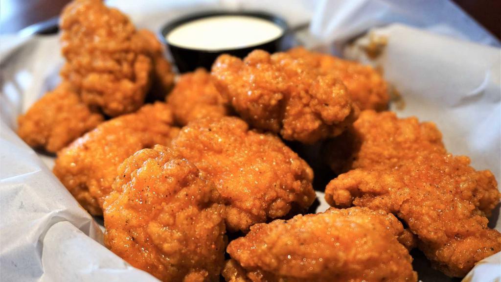 Boneless Wings · All white meat boneless wings tossed in your choice of sauce with ranch.