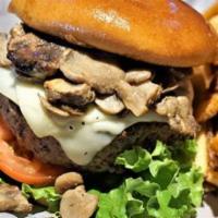 Shroom & Swiss Burger · Smothered with sauteed mushrooms, Swiss cheese, lettuce, tomato and mayonnaise.