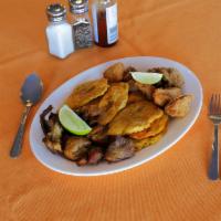 Mambo's Platter · Fried pork bites, Dominican style fried chicken and tostones.