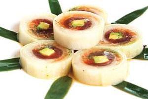 Narudo Special Fusion Roll · Tuna, salmon, white fish, avocado, scallion, tobiko, wrapped in cucumber slices, served with house ponzu sauce.