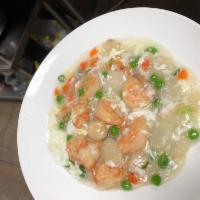 Shrimp with Lobster Sauce · Shrimp, peas, carrots, water chestnuts and egg white in white sauce.