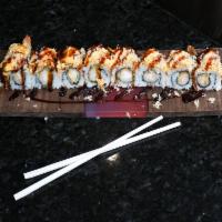 Oh Snap Roll · Shrimp tempura, topped with baked crab and scallop mix, tempura flakes and unagi sauce.