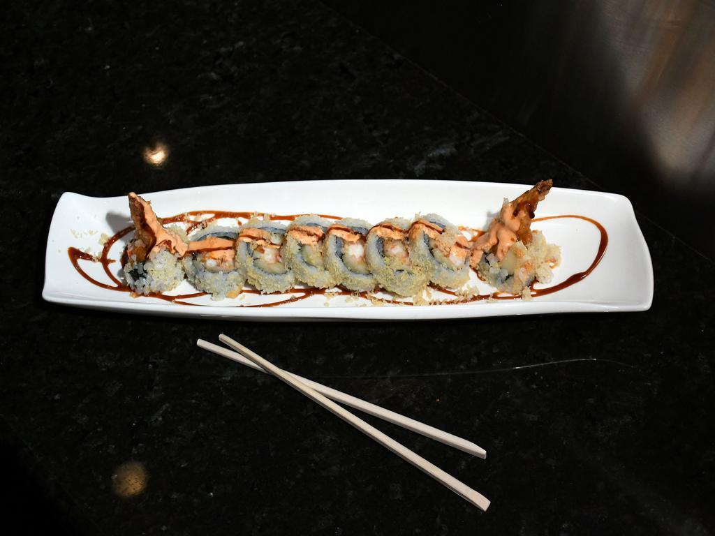 Captain Crunch Roll · Shrimp tempura, kani, cucumber and tempura flakes.