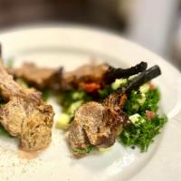 Ghustaba · New Zealand lamb chops cooked in tandoor with yogurt and scented with nutmeg and ajwain, ser...