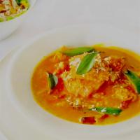 Chicken Madras · Chicken chunks stewed in hot coconut curry sauce, red chilies and mustard seeds. Medium spic...