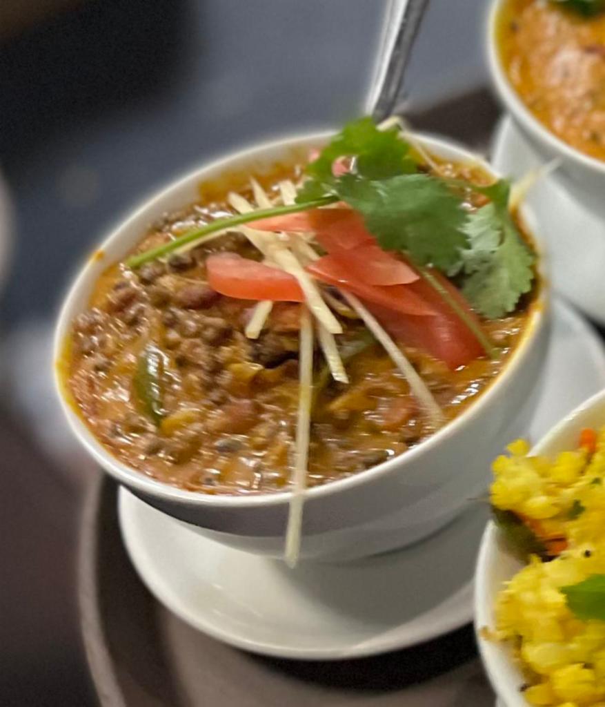 Dal Makhani · An authentic Punjabi lentil dish medley of kidney beans, black beans, split peas and green moong.