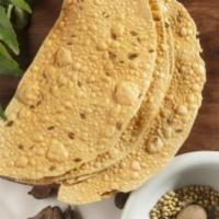 Pappad · A Papadam or Appalam is an Indian cracker ,cooked with dry heat until crunchy.  Made from le...
