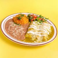 Enchiladas de Queso  · 2 enchiladas, covered with ranchero sauce, rice, beans, salad and sour cream.
