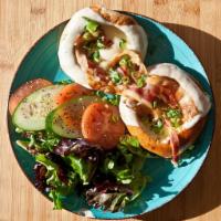 Shepherd BLT · Sliced bagel with 2 eggs sunny side up, applewood bacon, mozzarella cheese and side of even ...