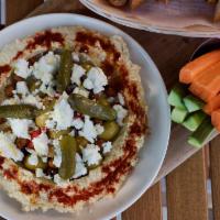 Hummus Plate · Feta, marinated olives, cucumbers, roasted red peppers and cornichons served with crostini a...