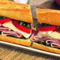 #7. Prosciutto Sandwich · Mozzarella, tomatoes, fresh basil, basil pesto, extra virgin olive oil and balsamic vinegar.
