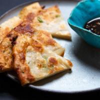 Scallion Pancake · Savory folded flatbread. 