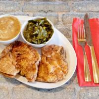 Country Fried Pork Chops Meal · 2 Pork chops covered in rice and brown gravy. Your choice of 1 side.