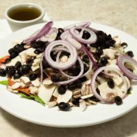 Antipasto Salad · Mixed greens piled high with pepperoni, mushrooms, salami, provolone cheese, olives, red oni...