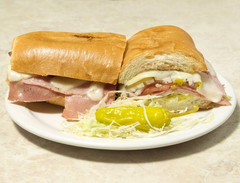 Italian Sandwich · Ham, cotto salami, mortadella, dry salami and provolone. Comes with lettuce, mayonnaise, red onion, pickles, pepperoncini and tomato with our house Italian dressingg. Mustard upon request.
