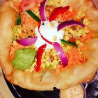 Taco Salad [Chicken ] · Fried tortilla bowl. Served with lettuce, chicken, black beans, guacamole, tomatoes, sour cr...