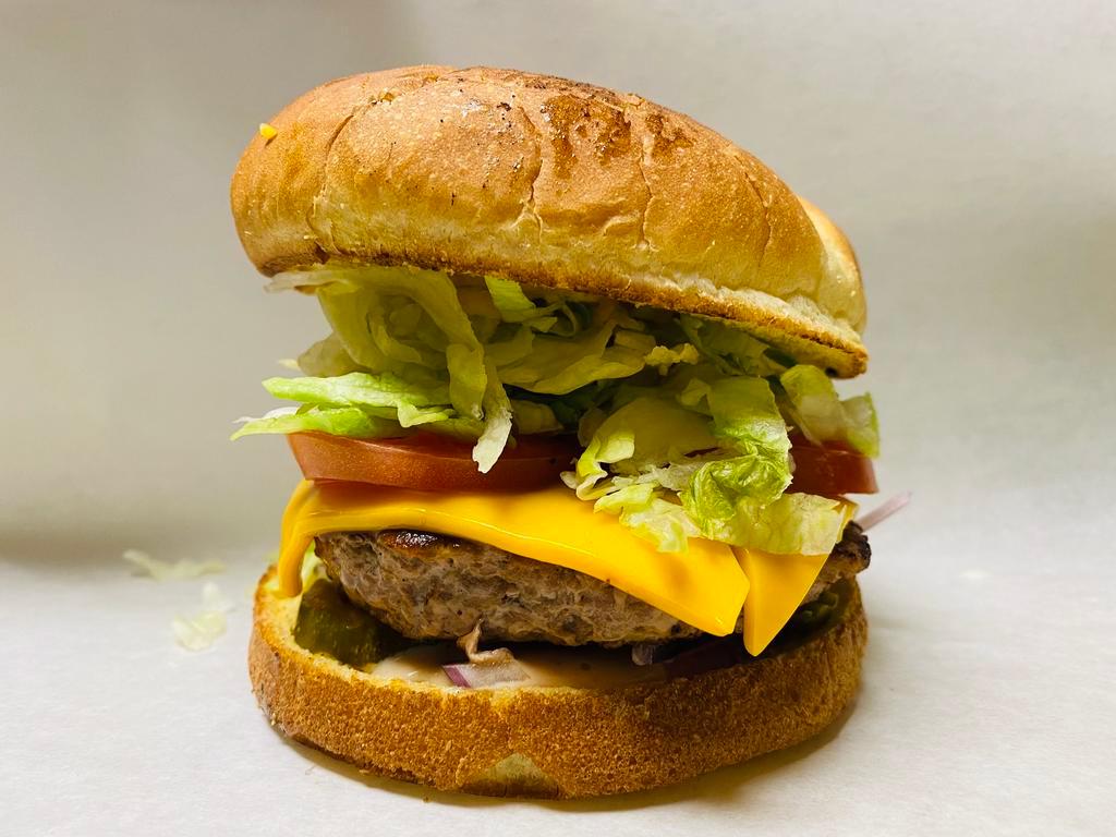 Turkey Burger · Turkey patty, American cheese, lettuce, tomato, onions, pickles and Thousand Island.