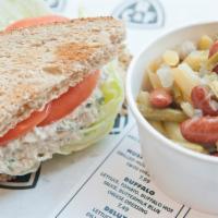 Chicken Salad Sandwich · Fresh, all natural, antibiotic-free chicken. Lettuce, tomato, on toasted wheat bread.