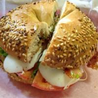 Egg Omelet Bagel · Scrambled eggs and veggie mix (tomato, red onion, bell pepper). Add avocado for an additiona...