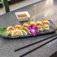 Protein Style Albacore Roll · Imitation crab, asparagus, and avocado wrapped in spicy tuna topped with albacore and mustar...