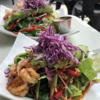 Shrimp Avocado Salad · Served with tomatoes, shallots and lettuce tossed in a chili lime juice. Spicy.